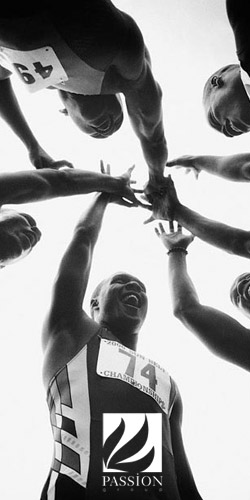 Athletes in a huddle.
